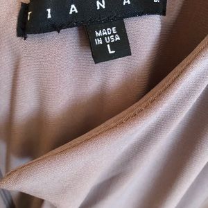 Tiana B. Women’s sleeveless jumpsuit. Size Large